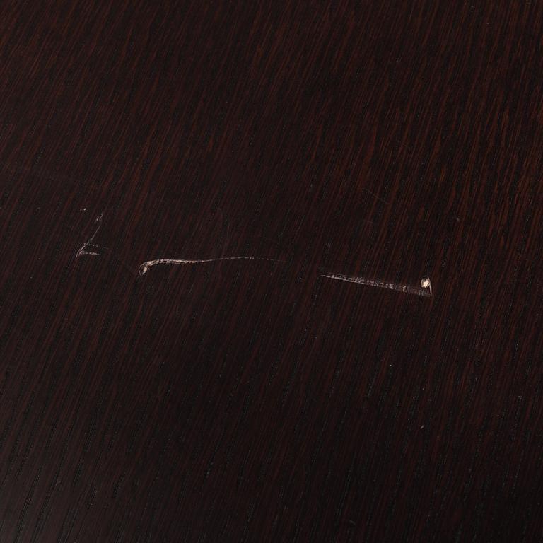 A "Athos" dining table by Paolo Piva for B&B Italia.