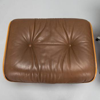 Charles and Ray Eames, a 1980s 'Lounge chair' and stool for Herman Miller.