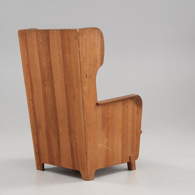 Axel Einar Hjorth, a stained pine 'Lovö' armchair, Nordiska Kompaniet, NK, Sweden 1930's.