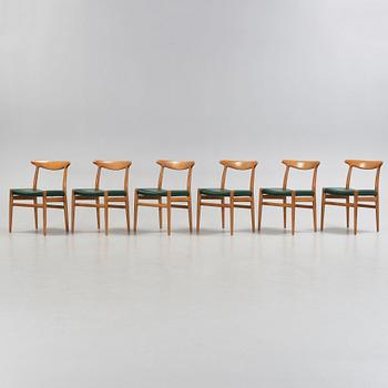 Hans J. Wegner, a set of six oak chairs, CM Madsen Fabriker, Denmark.