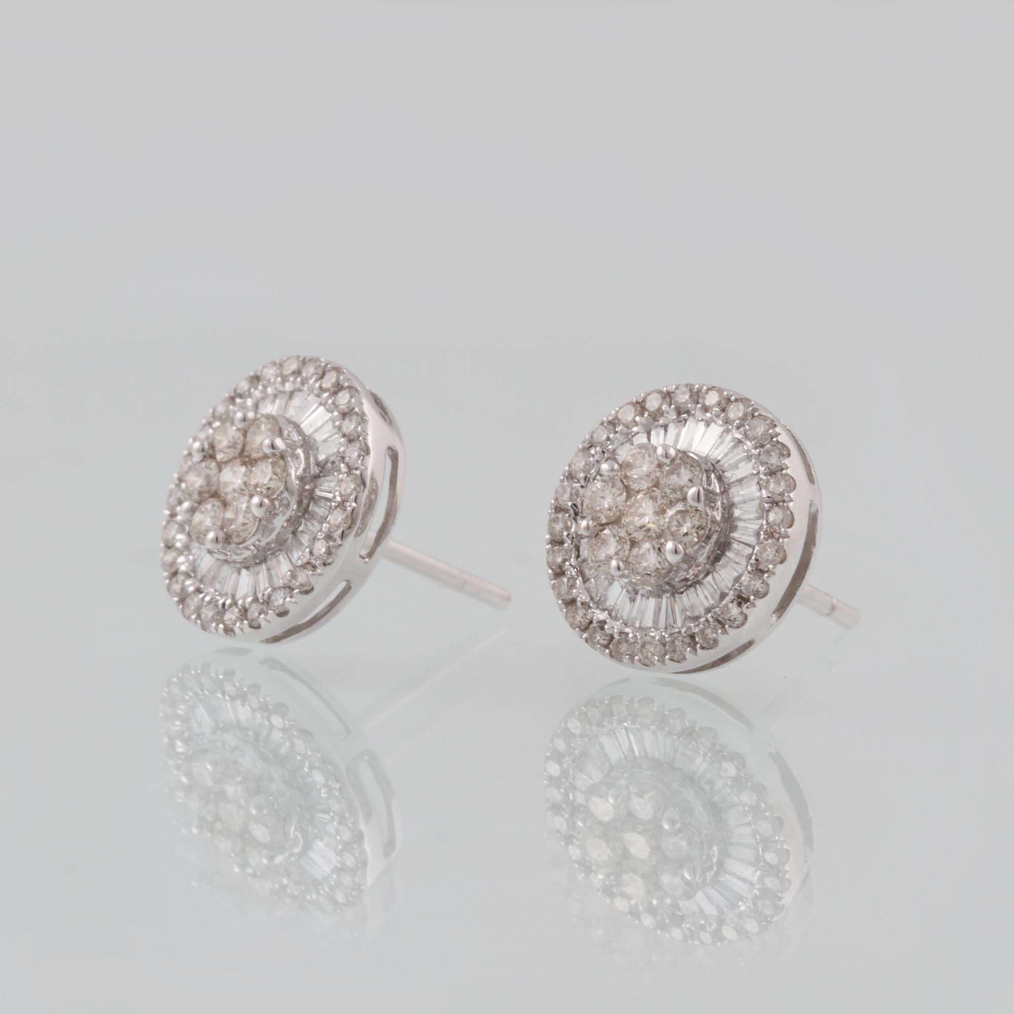 ÖRHÄNGEN, 18K vitguld med briljant och baguetteslipade diamanter ca 0.87 ct. Vikt 2,7 gram.