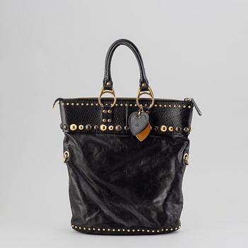 Gucci, a black leather handbag.