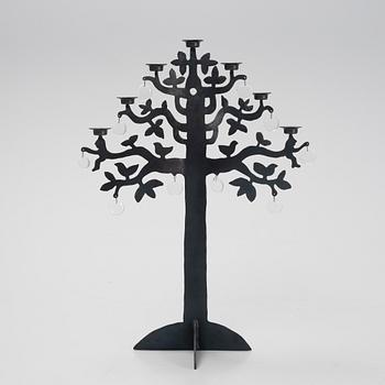 a blackened iron candelabrum, 'Livets träd', by Bertil Vallien for Boda Smide.