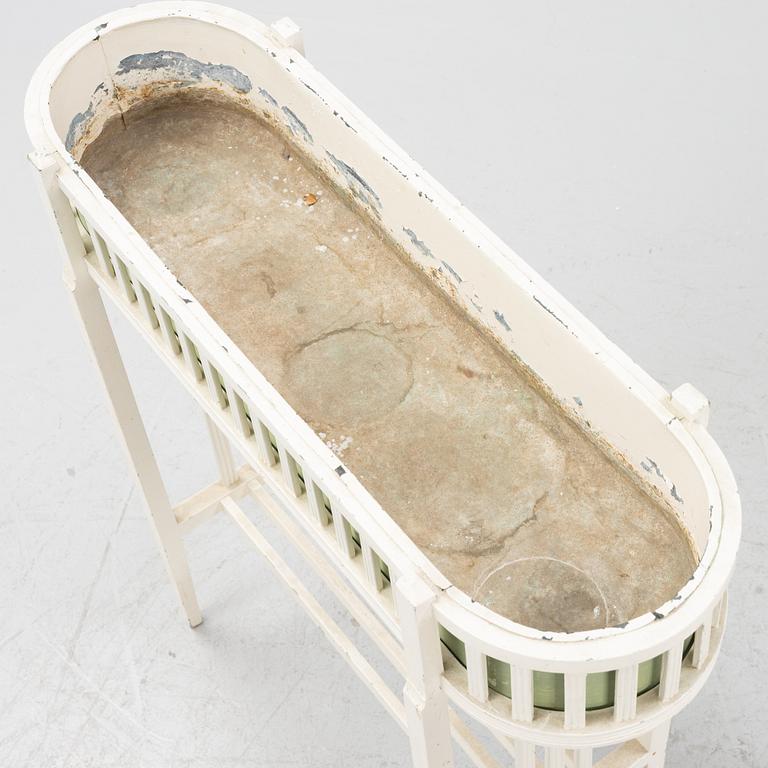 A painted flower stand, early 20th Century.