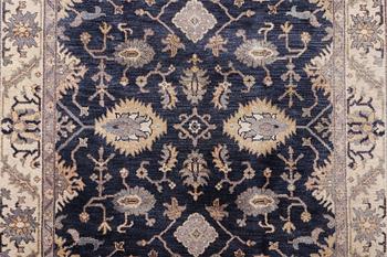 A Mamluk design carpet, c. 305 x 245 cm.