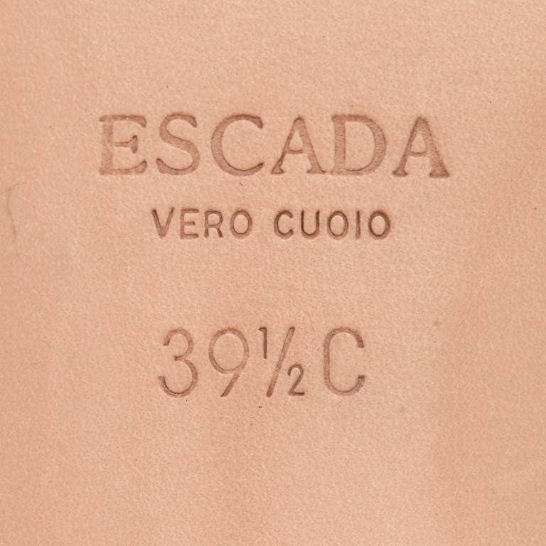 ESCADA, a pair of jeanscloth slip-in.