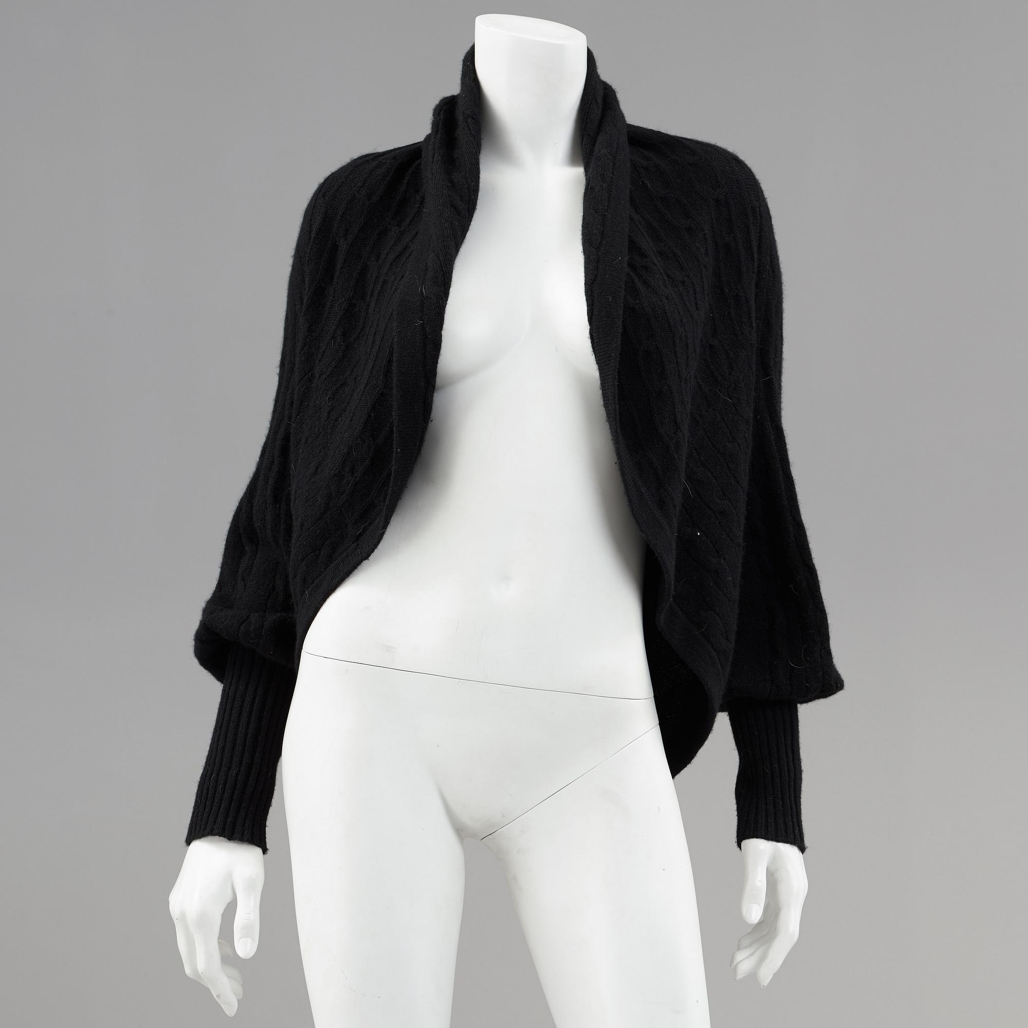 Two cardigans and a silkblouse by Ralph Lauren.