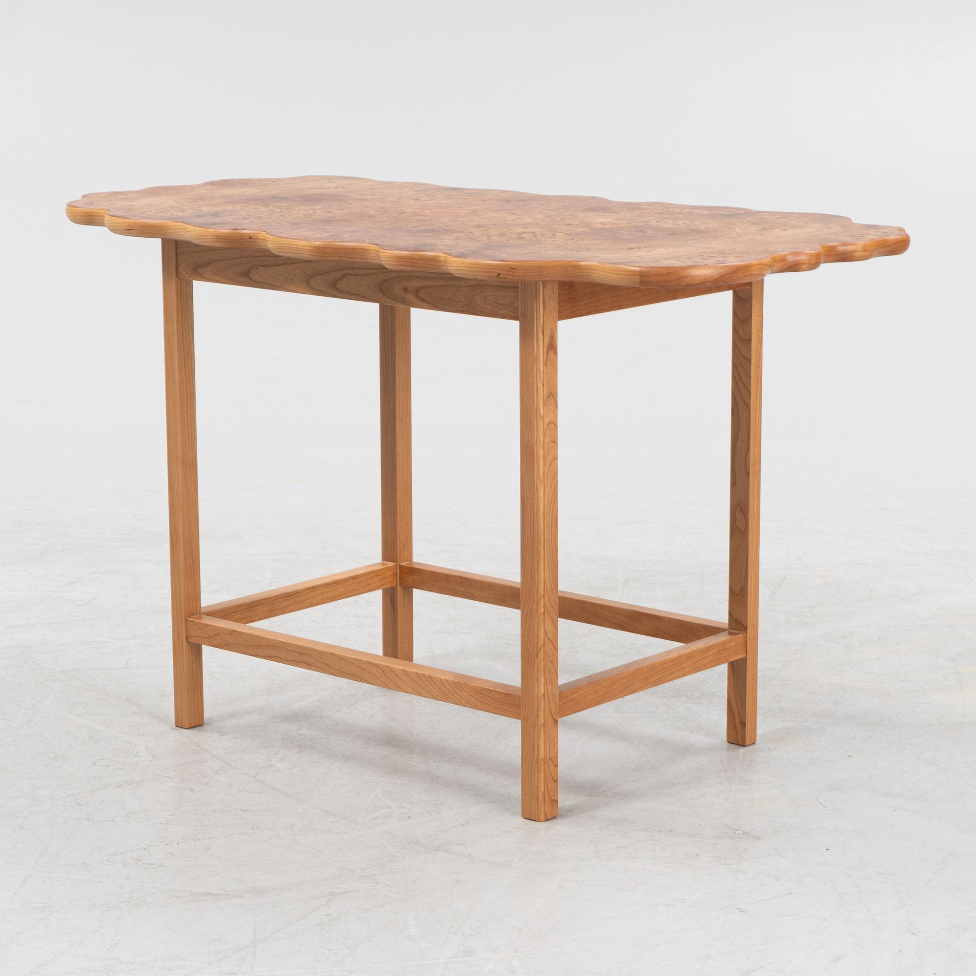 Josef Frank, an elm root top model 1058 coffee table from Firma Svenskt Tenn.