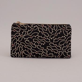 CLUTCH, Charlotte Olympia.