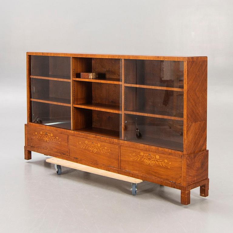 A Swedish Modern 1940s mahogany book cupboard.