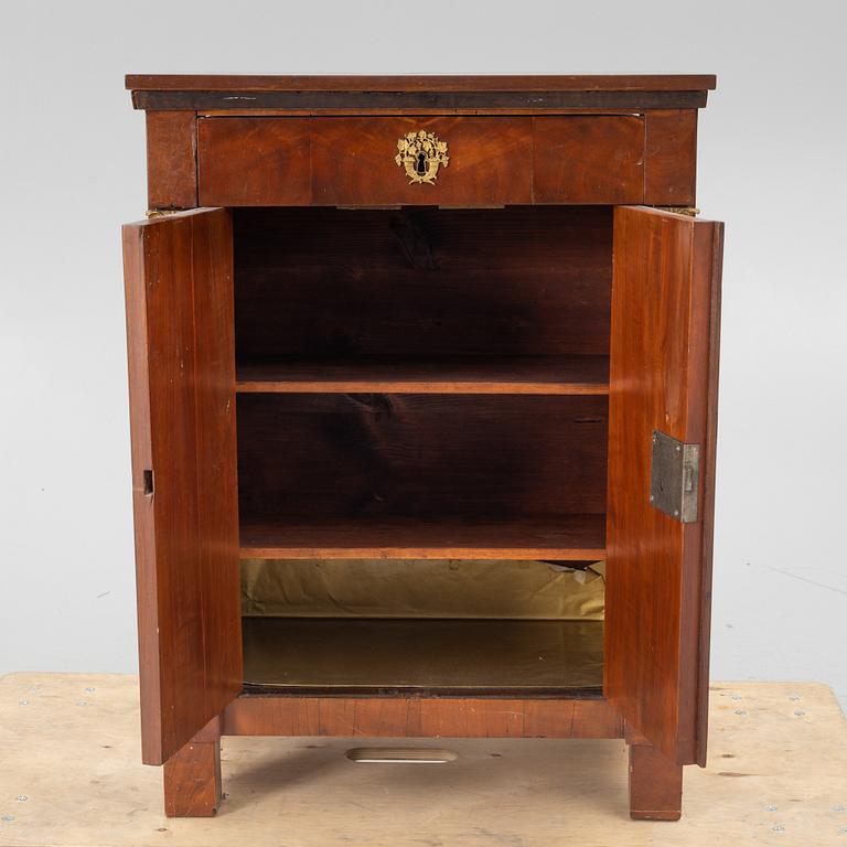 An Empire cabinet, first half of the 20th Century.