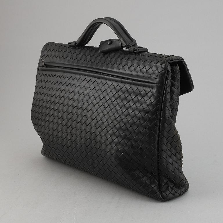 Bottega Veneta, a black intrecciato leather briefcase.