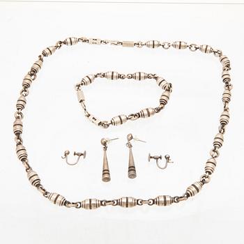 A set of silver necklace, earrings and bracelet  with black oak from shipwrecks, Stig Bjerre Landskrona 1951.