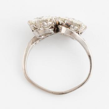 A platinum ring set with two old-cut diamonds with a total weight of ca 5.00 cts.