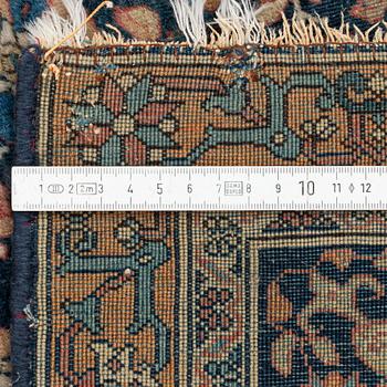 An antique Kashan 'Mohtasham' rug, c. 206 x 131 cm.