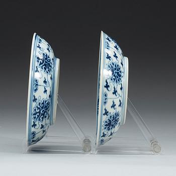 A pair of blue and white lotus dishes, Qing dynasty, Guangxu mark and period (1874-1908).