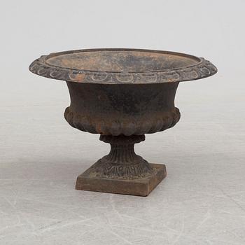 An early 20th century iron garden urn.