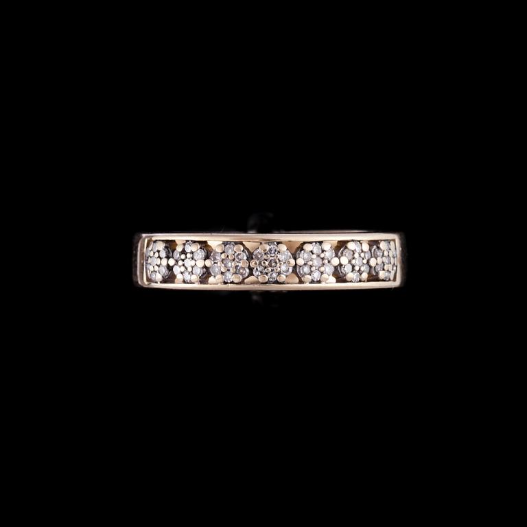 RING, guld 14K, små diamanter, enligt gravyr 0,17 ct. Vikt 3,4 g.