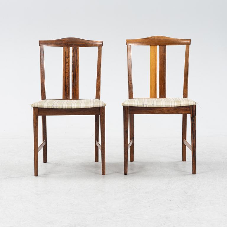A 1960's/70's rosewood veneered dining group.