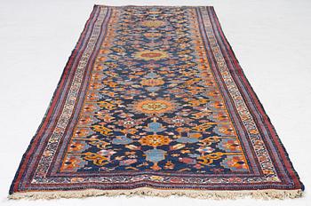 A north-west Persian, semi-antique runner, c. 340 x 110 cm.