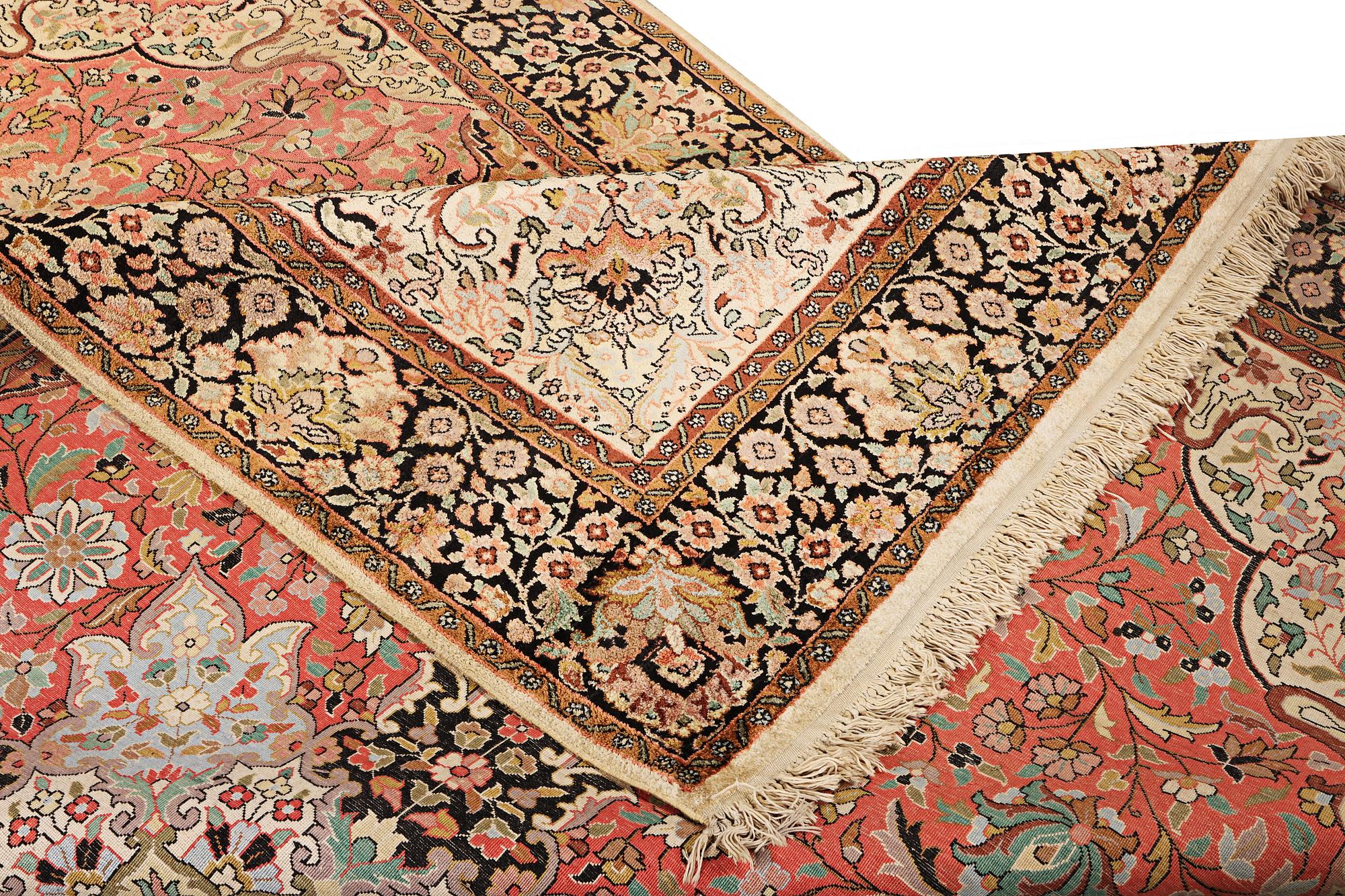A silk Kashmar carpet, c. 280 x 177 cm.