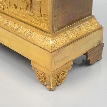 An Empire mantel clock, first half of the 19th century.
