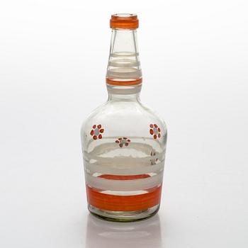 A set of 6 snapsglasses and a bottle designed by Aino Aalto for Karhula in the 1930-1940's.