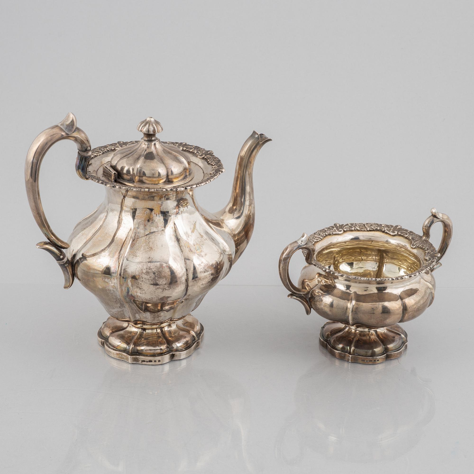 A silver coffee pot and a sugarbowl, marks of J. Mynttinen, Helsinki, Finland 1932.