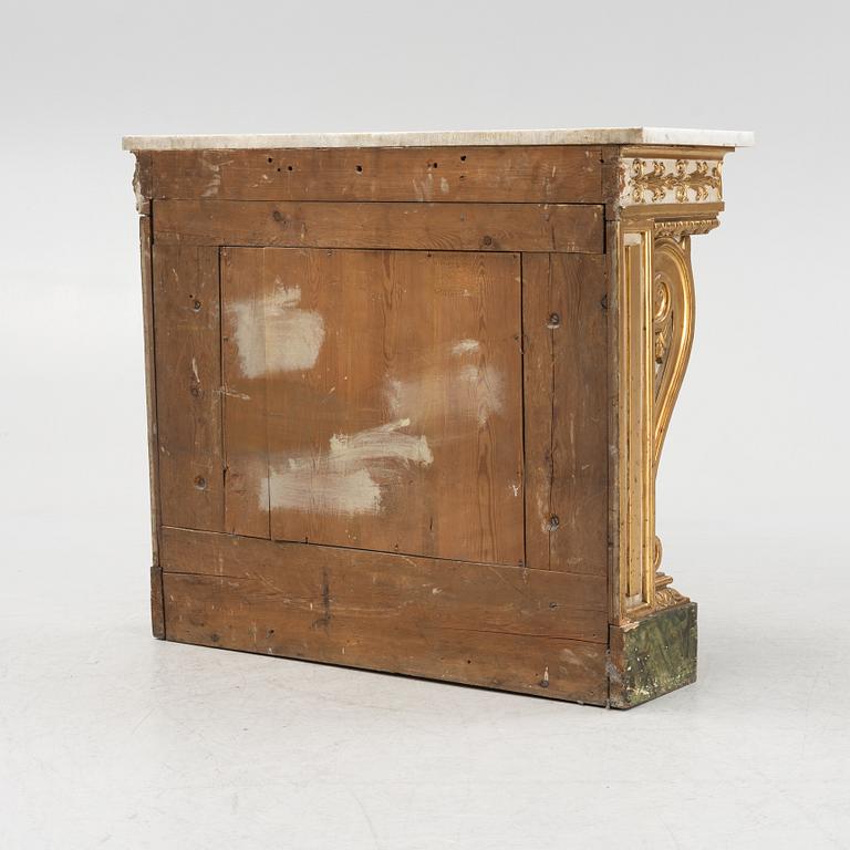 A Swedish late Empire giltwood and marble console, 1830's/40's.