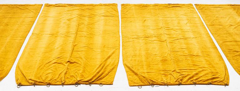 A set of four yellow velvet curtains, 1910's/20's, ca 247 x 120 cm.