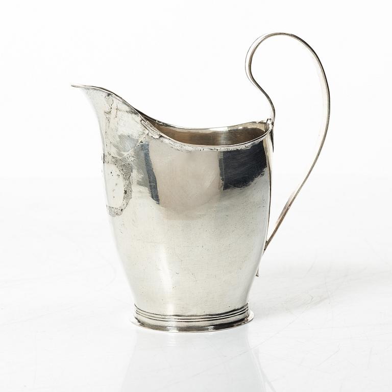 A Swedish 19th century silver creamer, mark of Nils Högrell, Stockholm 1823.