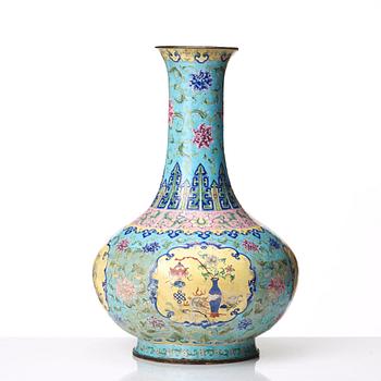 An enamel on copper vase, Qing dynasty, circa 1800.