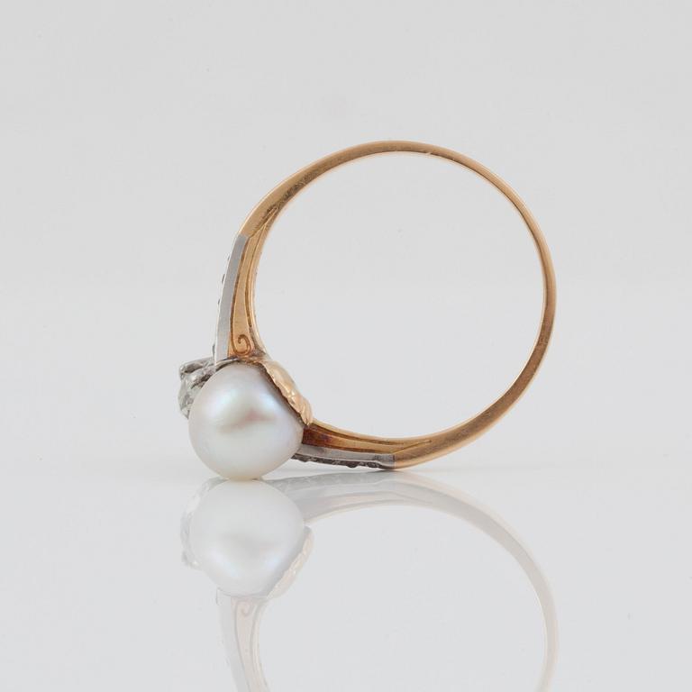 A old-cut diamond, circa 1.10 ct H-I/VS, and pearl ring.
