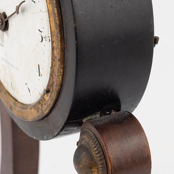 An Empire mantle clock from the 19th century.