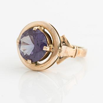 Bracelet and ring with color-changing synthetic stones.