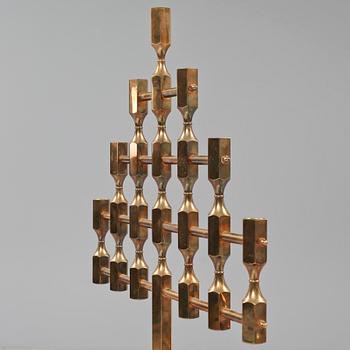 GOLVLJUSSTAKE, mässing, Gusum, 1900-talets fjärde kvartal.