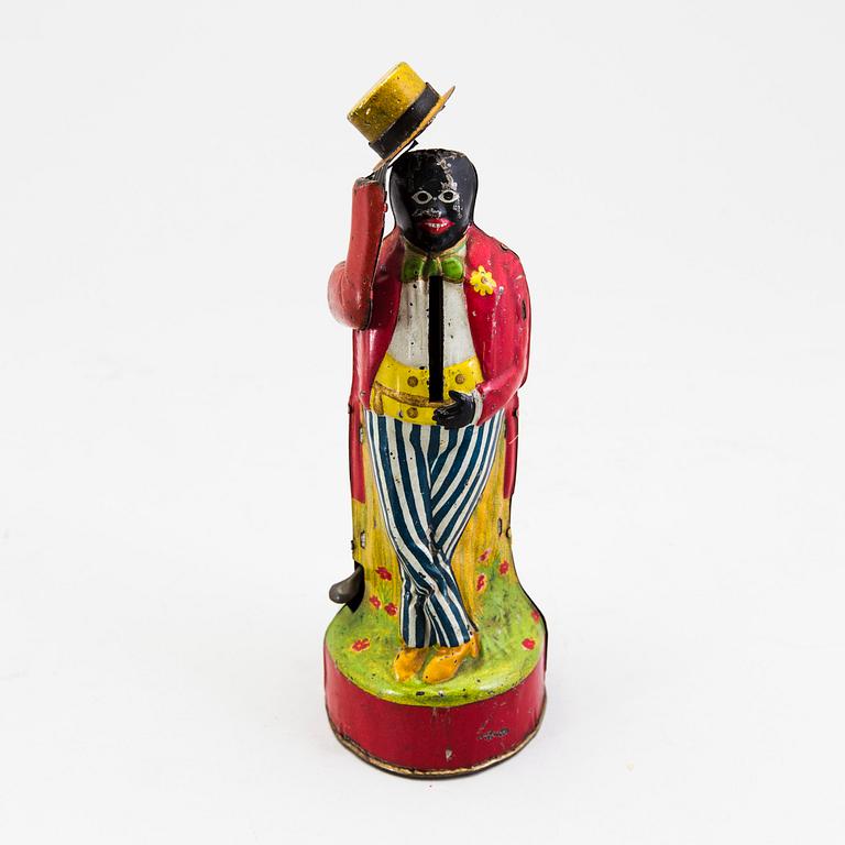 A tinplate coin bank by J. Levy & Co, England, probably of German manufacture, ca 1909.