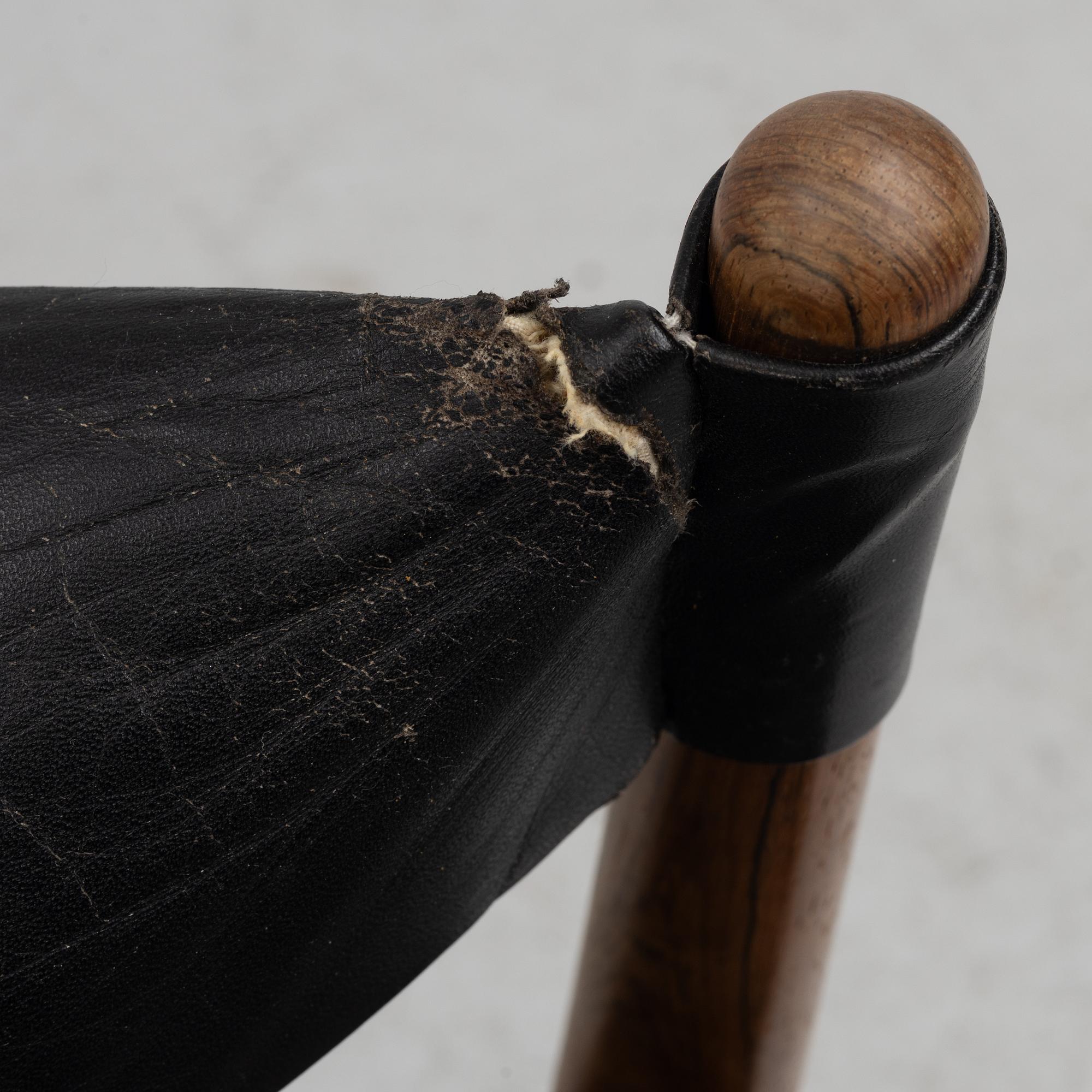 Kristian Solmer Vedel, a pair of "Modus" armchairs and a low table, Søren Willadsen, 1960's.