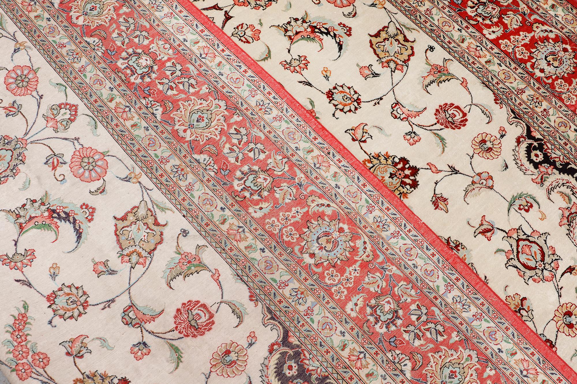 A silk Ghom carpet, 295 x 195 cm.