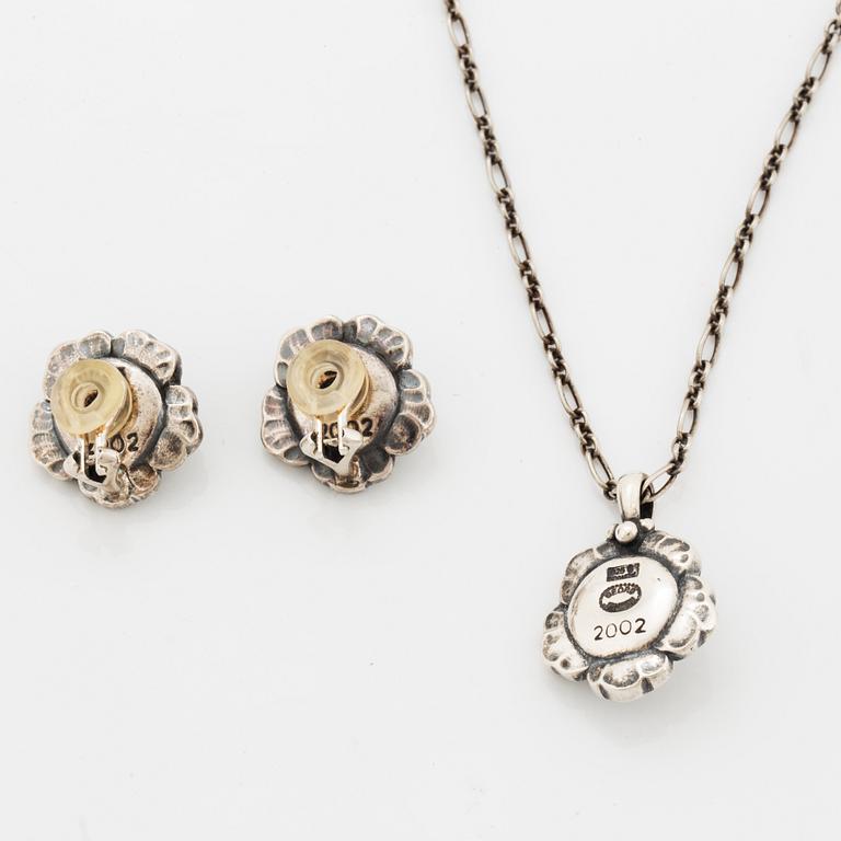 Georg Jensen Heritage silver a pair of earrings and a necklace.