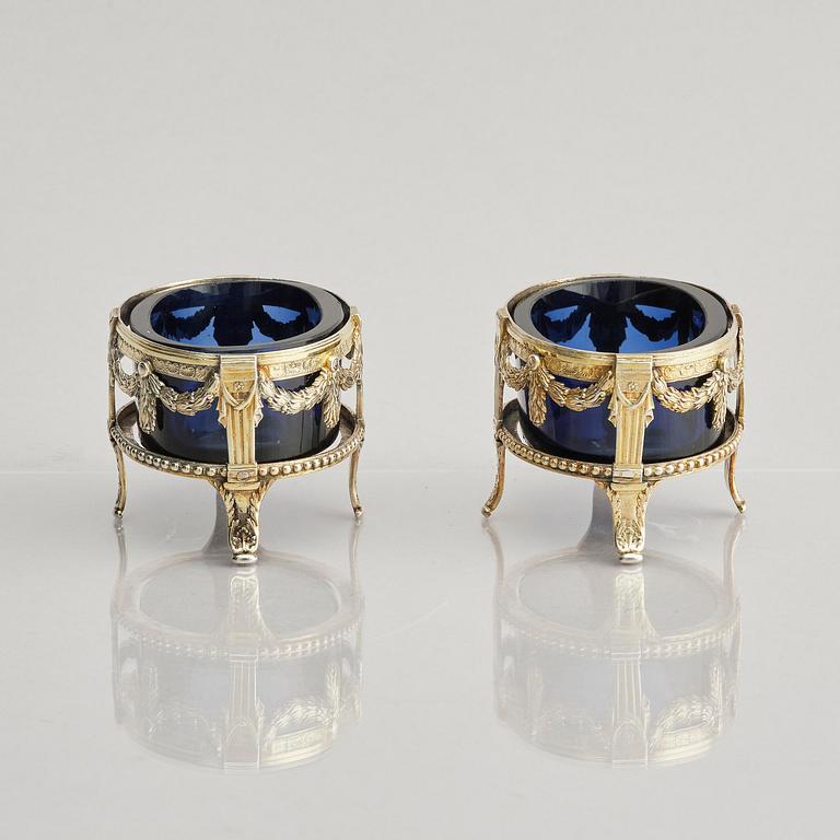 A pair of Swedish 18th century silver and blue glass salt cellars, mark of Pehr Zethelius, Stockholm 1775.