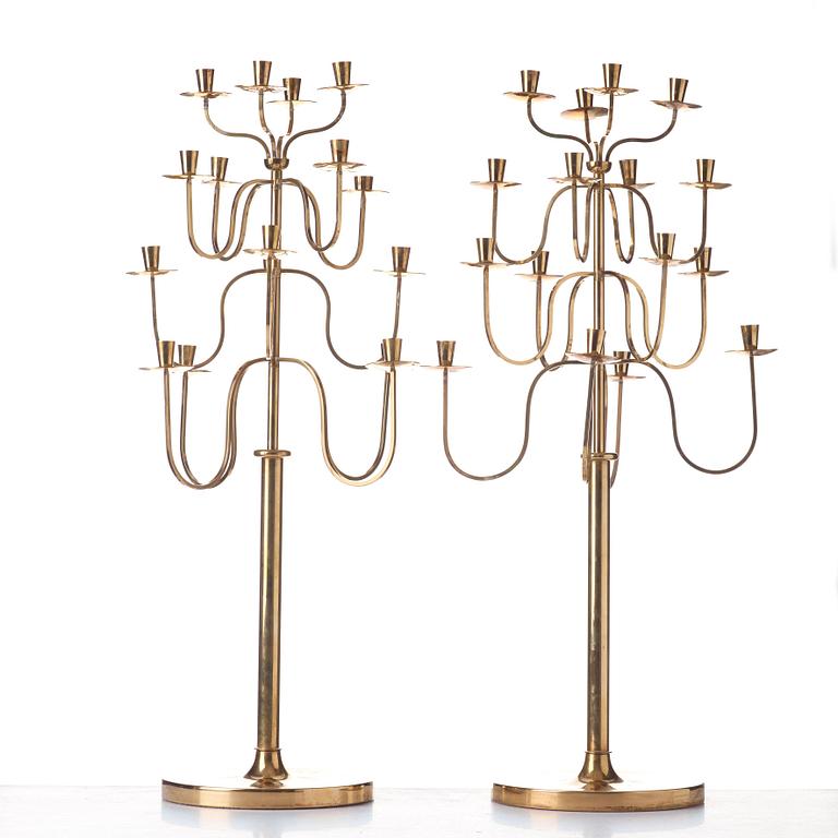 Svenskt Tenn, a pair of Swedish Modern brass candelabra, 1940-50's, probably designed by Josef  Frank.