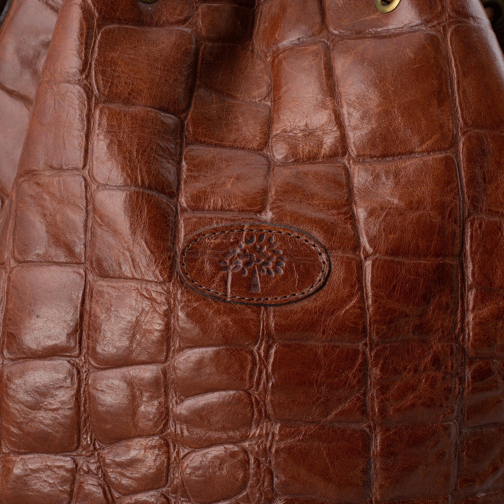MULBERRY, a leather drawstring bag.