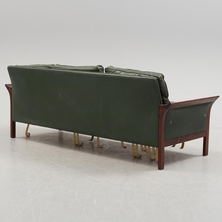 A 1960's Danish sofa, with 2 easy chairs and 2 tables by Glostrup.