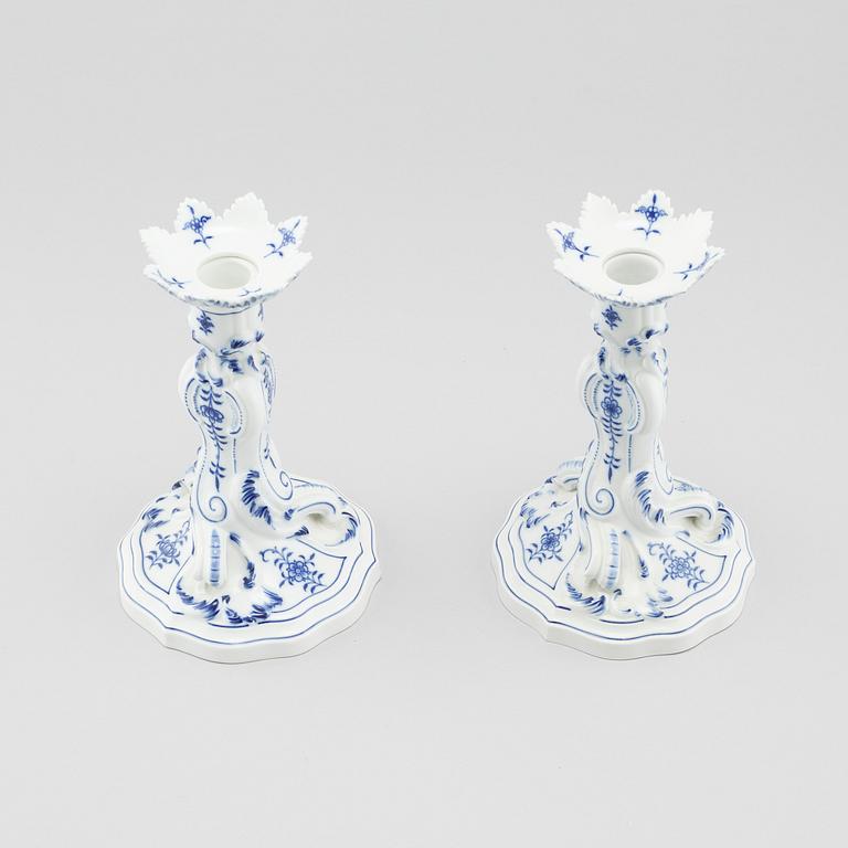 A pair of porcelain candle sticks by Meissen, second half of the 20th century.