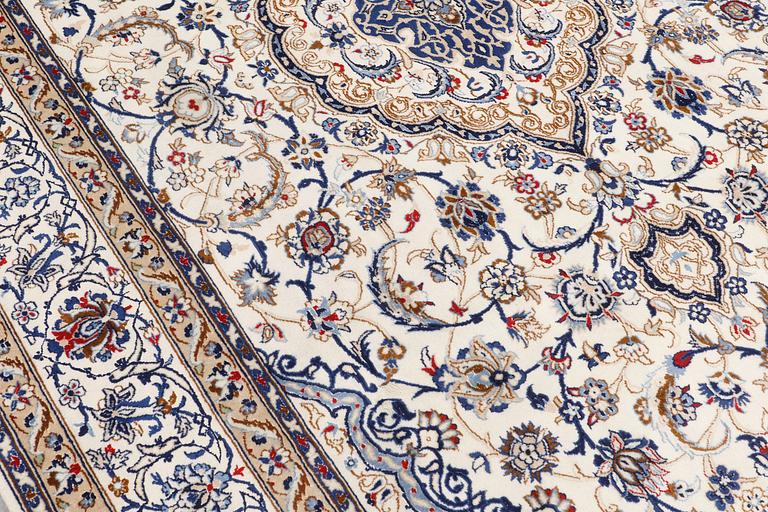 A carpet, Nain Part silk, 312 x 207 cm.