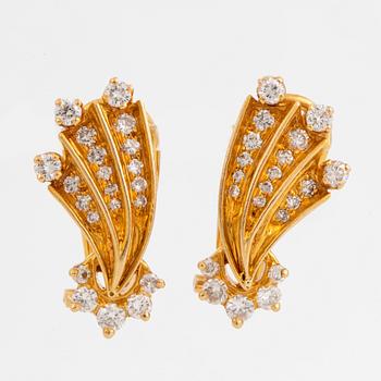 Brilliant-cut diamond earrings.