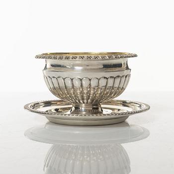 A set of three Swedish silver sauce ladles and a small sauce bowl, mark of Johan Petter Grönwall,  Stockholm 1824-37.