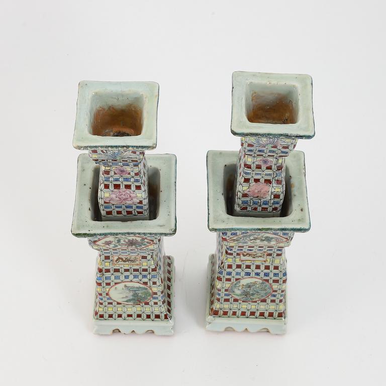 A pair of Chinese porcelain candlesticks, 19th century.