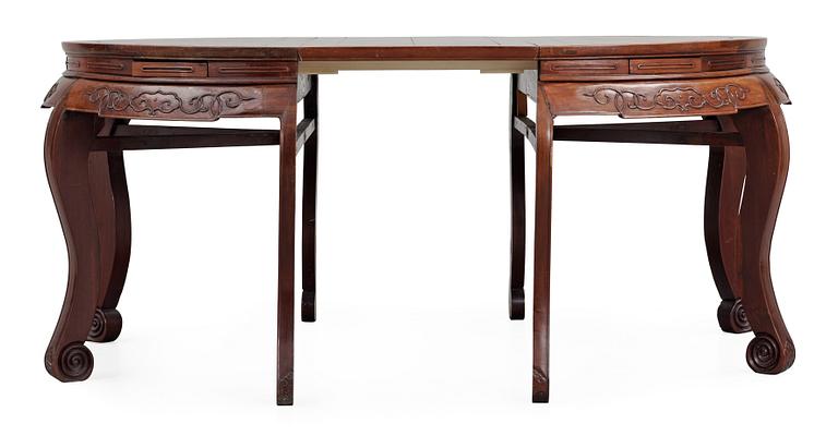 A hardwood dinner table, early 20th Century.